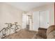 Bright bedroom with neutral walls, plush carpet, and closet with sliding doors at 7003 S 23Rd Ln, Phoenix, AZ 85041