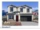 New two-story home with a two-car garage, neutral paint, mountain views and desert landscaping at 7384 W Buckhorn Trl, Peoria, AZ 85383