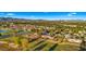 Aerial view of residential community on a lush golf course with mountain views at 7424 N Via Camello Del Norte -- # 185, Scottsdale, AZ 85258