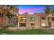 Home exterior featuring a patio and a balcony overlooking landscaped lawn at 7424 N Via Camello Del Norte -- # 185, Scottsdale, AZ 85258