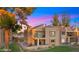 Beautiful home exterior featuring a balcony and patio, surrounded by lush landscaping at 7424 N Via Camello Del Norte -- # 185, Scottsdale, AZ 85258