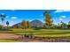 Expansive golf course with meticulously manicured greens, mature trees, and views of Camelback Mountain at 7424 N Via Camello Del Norte -- # 185, Scottsdale, AZ 85258