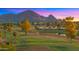 Lush golf course with serene ponds and mountain backdrop at 7424 N Via Camello Del Norte -- # 185, Scottsdale, AZ 85258
