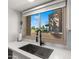 Kitchen sink with a view overlooking the golf course at 7424 N Via Camello Del Norte -- # 185, Scottsdale, AZ 85258