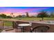 Relaxing patio space with golf course views, ideal for enjoying Arizona sunsets and outdoor living at 7424 N Via Camello Del Norte -- # 185, Scottsdale, AZ 85258