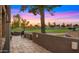 Private patio with outdoor grill, landscaping, and golf course view at 7424 N Via Camello Del Norte -- # 185, Scottsdale, AZ 85258
