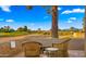 Relaxing outdoor patio with comfortable seating and views of the well-maintained golf course at 7424 N Via Camello Del Norte -- # 185, Scottsdale, AZ 85258