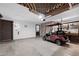 Spacious garage featuring a golf cart, workbench and storage cabinets at 772 Leisure World --, Mesa, AZ 85206