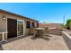 Inviting patio with a dining table and chairs, with views of the backyard at 772 Leisure World --, Mesa, AZ 85206