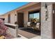 Cozy front porch featuring seating with chairs, creating a welcoming outdoor space at home at 772 Leisure World --, Mesa, AZ 85206