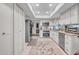 Well-lit kitchen with stainless steel appliances, white cabinetry, and tile flooring for a modern, clean aesthetic at 8202 N 21St Dr # B101, Phoenix, AZ 85021