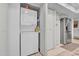 Convenient kitchen laundry area featuring a stacked washer and dryer, maximizing space and utility at 8202 N 21St Dr # B101, Phoenix, AZ 85021