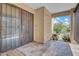 Charming covered porch entrance with decorative security door offering natural light and curb appeal at 8202 N 21St Dr # B101, Phoenix, AZ 85021