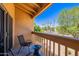 Relaxing balcony view with seating and palm trees in the distance at 8414 N Central Ave # C, Phoenix, AZ 85020
