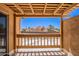 View of a balcony with view of the outdoor community and neighboring homes at 8414 N Central Ave # C, Phoenix, AZ 85020