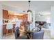 Open concept: dining room connected to kitchen and living area with natural lighting at 8414 N Central Ave # C, Phoenix, AZ 85020