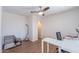 Home office with sleek floors, a ceiling fan, and a large desk area at 8414 N Central Ave # C, Phoenix, AZ 85020
