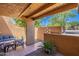 Charming outdoor patio with comfortable seating and desert landscaping for relaxation at 8414 N Central Ave # C, Phoenix, AZ 85020