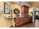 Stylish bathroom with granite counters, dark wood cabinetry, and unique black vessel sink at 8540 W Wescott Dr, Peoria, AZ 85382