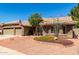 Charming single-story home featuring a desert-landscaped front yard and a two-car garage at 8540 W Wescott Dr, Peoria, AZ 85382