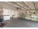 A well-organized garage features ample storage, shelving, and workspace for efficient home maintenance at 8566 N 110Th Ave, Peoria, AZ 85345