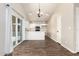 Bright eat-in kitchen boasts white cabinetry, stainless steel appliances, and modern lighting at 8566 N 110Th Ave, Peoria, AZ 85345