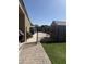 This backyard features a well-kept shed, patio, and secure, gated enclosure at 10236 W Wood St, Tolleson, AZ 85353