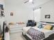 Bright bedroom with a comfortable bed, dresser, and desk, perfect for relaxation and productivity at 10236 W Wood St, Tolleson, AZ 85353