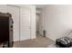 Bright bedroom with a safe, and a storage cabinet at 12505 W Kaler Dr, Glendale, AZ 85307