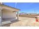 View of a backyard with covered patio on a sunny day, presenting an opportunity for landscaping and outdoor activities at 12515 W Marguerite Ave, Avondale, AZ 85323