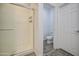 Bathroom featuring a glass-enclosed shower and separate toilet area at 12515 W Marguerite Ave, Avondale, AZ 85323