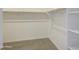 Walk-in closet with shelving for storage and organization at 12515 W Marguerite Ave, Avondale, AZ 85323
