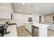 Kitchen has stainless steel appliances and a huge island with seating at 12515 W Marguerite Ave, Avondale, AZ 85323