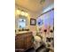 Bathroom featuring granite countertops, wood vanity, and flower shower curtain at 13037 W Laurel Ln, El Mirage, AZ 85335