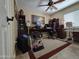 Office with ceiling fan, desk, and office equipment and supplies at 13037 W Laurel Ln, El Mirage, AZ 85335