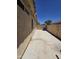 Side yard area with ample space, showcasing potential for storage or outdoor activities at 13037 W Laurel Ln, El Mirage, AZ 85335