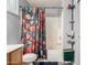 Standard bathroom featuring a shower-tub combo, neutral finishes, and essential amenities at 1376 E Rosemary Trl, Casa Grande, AZ 85122