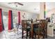 Inviting dining area featuring a table set for dining, complemented by natural light and neutral decor at 1376 E Rosemary Trl, Casa Grande, AZ 85122