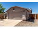 Charming single-story home features low-maintenance landscaping and attached two car garage at 1376 E Rosemary Trl, Casa Grande, AZ 85122