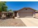Charming single-story home features low-maintenance landscaping and attached two car garage at 1376 E Rosemary Trl, Casa Grande, AZ 85122