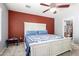Comfortable bedroom featuring soft carpet, a cozy bed, and calming natural light at 1376 E Rosemary Trl, Casa Grande, AZ 85122