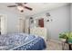 Serene bedroom with a comfortable bed, soft lighting, and minimalistic decor at 1376 E Rosemary Trl, Casa Grande, AZ 85122