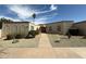 Charming single-story home featuring a desert landscaped yard and a welcoming entranceway at 13857 N 108Th Dr, Sun City, AZ 85351