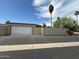 Attached two car garage, with block wall in the front at 13857 N 108Th Dr, Sun City, AZ 85351