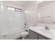 Bright bathroom features a tub, shower, and vanity at 1410 S Boulder St # A, Gilbert, AZ 85296