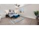 Bright bedroom with ceiling fan, window and contemporary decor at 1410 S Boulder St # A, Gilbert, AZ 85296