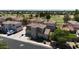 Two-story home featuring a well-manicured lawn and a view of the community golf course at 1410 S Boulder St # A, Gilbert, AZ 85296