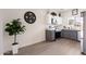 Eat-in kitchen with stainless steel appliances, gray cabinets, and sleek countertops at 1410 S Boulder St # A, Gilbert, AZ 85296
