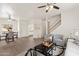 Open-concept living space featuring light wood floors, modern decor, and an adjacent dining area at 1410 S Boulder St # A, Gilbert, AZ 85296