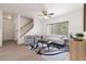 Bright living room featuring modern decor, light wood floors, and a cozy seating arrangement at 1410 S Boulder St # A, Gilbert, AZ 85296